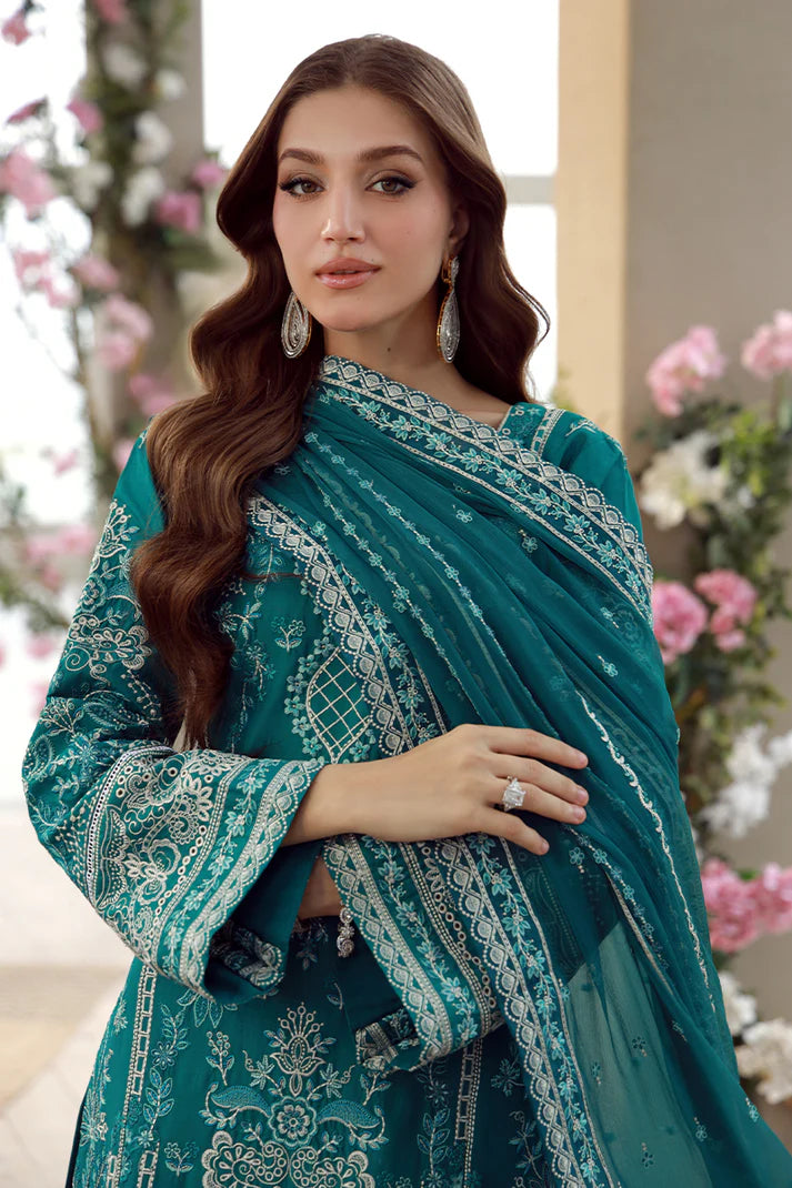 Model wearing teal Gulaal Ariana outfit with white thread embroidery, perfect for Pakistani luxury pret and festive wear online in the UK.