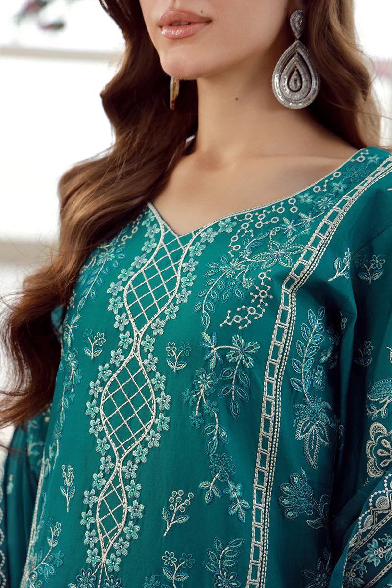 Model wearing teal Gulaal Ariana outfit with white thread embroidery, perfect for Pakistani luxury pret and festive wear online in the UK.