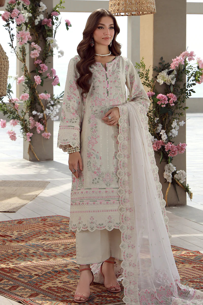 Model wearing off-white and pink embroidered Gulaal Kaia suit, perfect for Eid celebrations and Pakistani luxury pret online in UK.