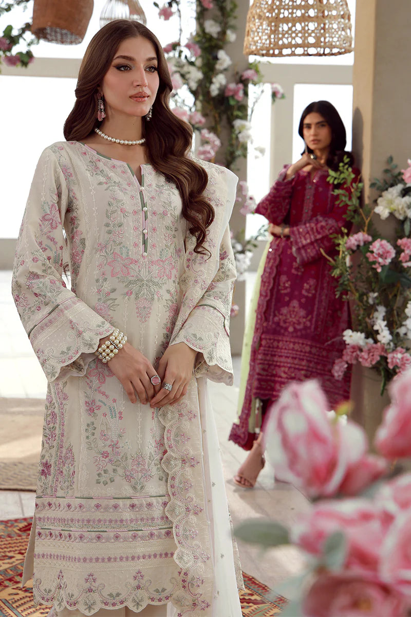 Model wearing off-white and pink embroidered Gulaal Kaia suit, perfect for Eid celebrations and Pakistani luxury pret online in UK.