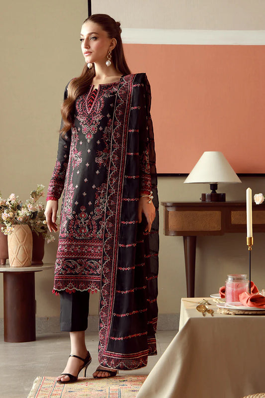 Model wearing black and maroon embroidered Gulaal Faina outfit, perfect for Eid wear and Pakistani luxury pret available online in the UK.
