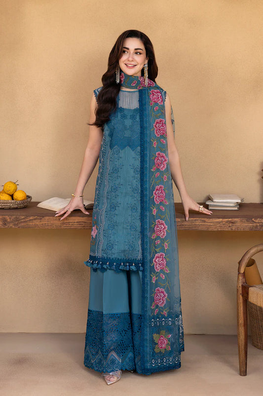 Model wearing teal blue sleeveless embroidered dress with floral pink dupatta from Saira Rizwan, Pakistani luxury pret, Pakistani clothes online in UK.
