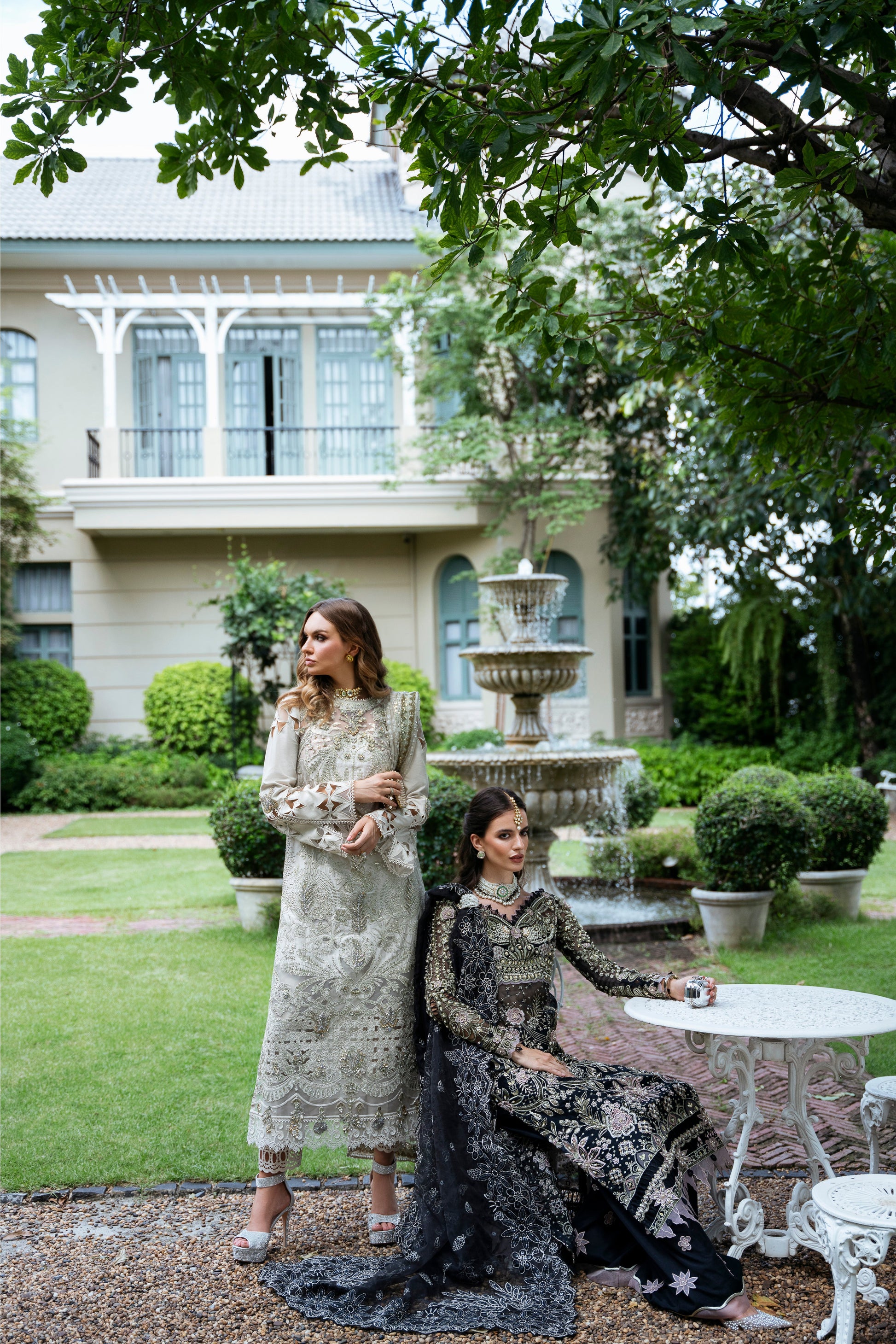 Model wearing Helena dress from Mysie by Tahira in a soft gold color, perfect for Pakistani luxury pret and online shopping in the UK.
