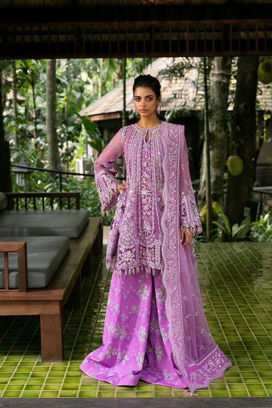 Model wearing Saira Rizwan LIYANA-SRF25-07 in lilac pink with intricate embroidery – Pakistani luxury pret, shop online in UK.
