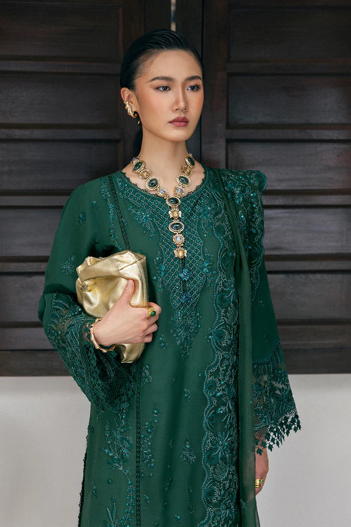 Model wearing emerald green Saira Rizwan CLAIR SREP08-25 from Sajri Eid Pret '25, Pakistani luxury pret outfit available online in UK.