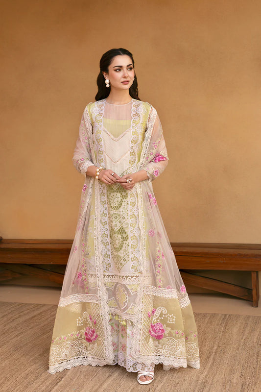 Model wearing pastel green and ivory embroidered long frock with floral dupatta from Saira Rizwan, Pakistani luxury pret, Pakistani clothes online in UK.