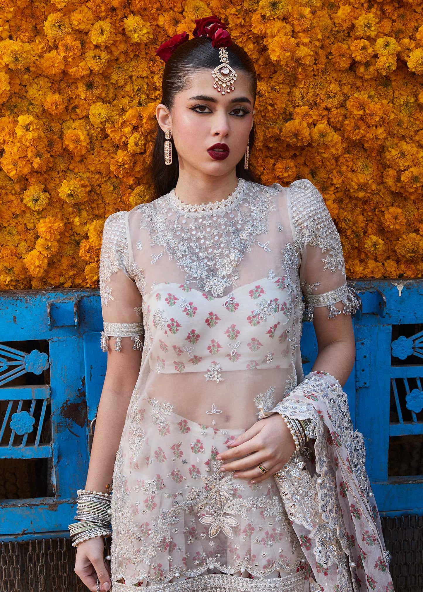 Model wearing Hussain Rehar Zareen ivory embroidered festive dress with floral details. Shop Pakistani clothes online in the UK now.