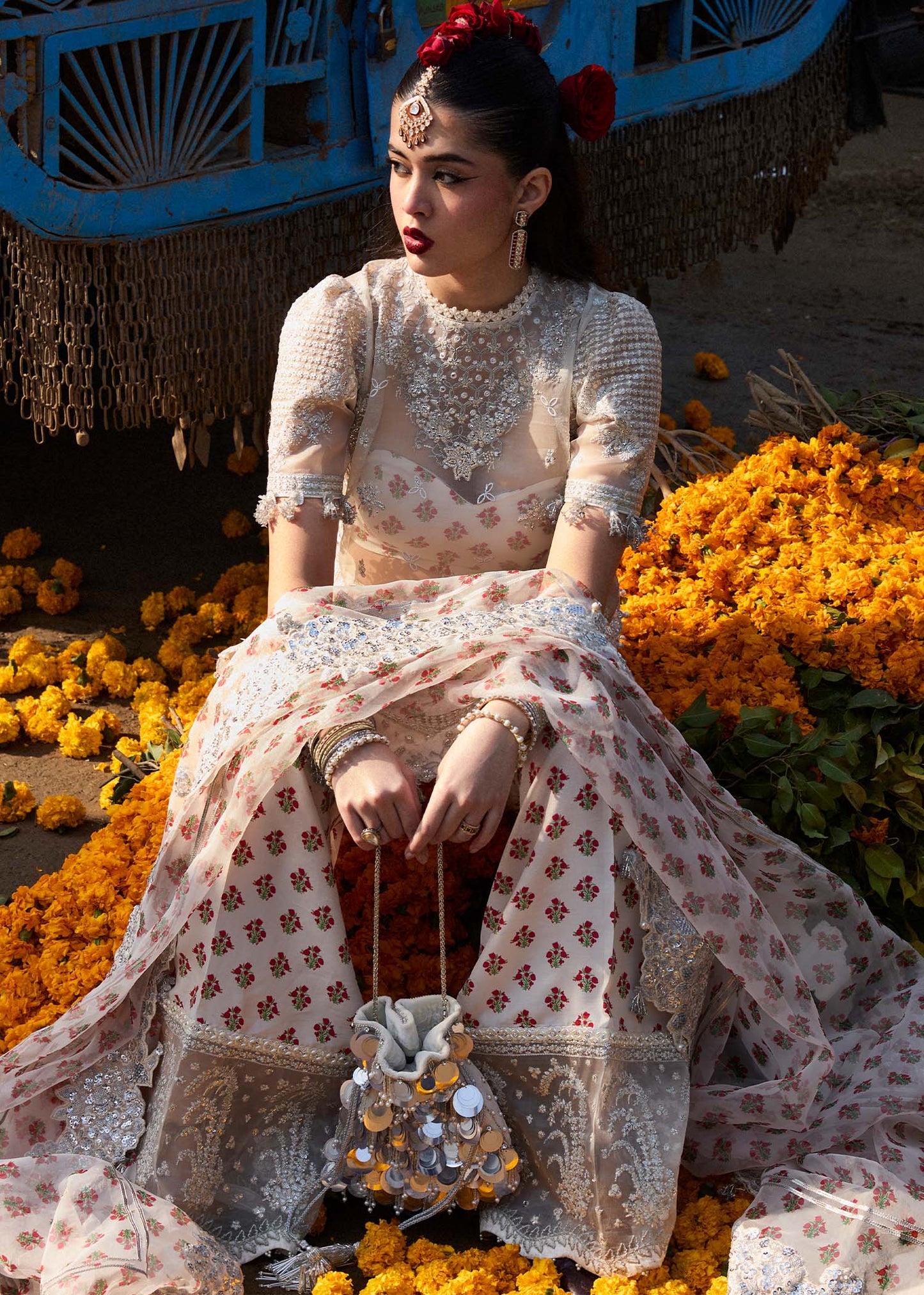 Model wearing Hussain Rehar Zareen ivory embroidered festive dress with floral details. Shop Pakistani clothes online in the UK now.