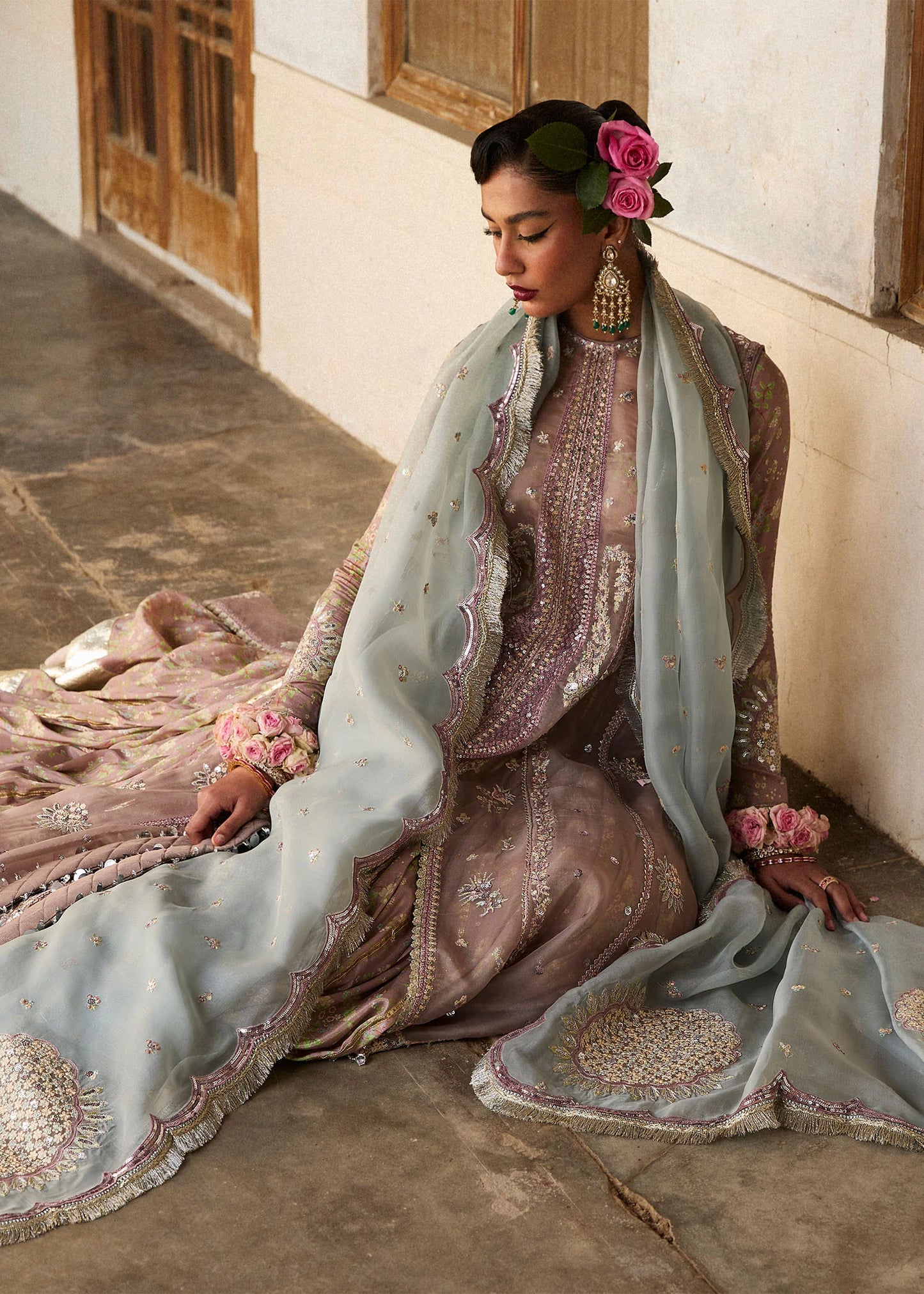 Model wearing Hussain Rehar Ziniya grey embroidered festive dress with intricate embellishments. Shop Pakistani clothes online in the UK now.
