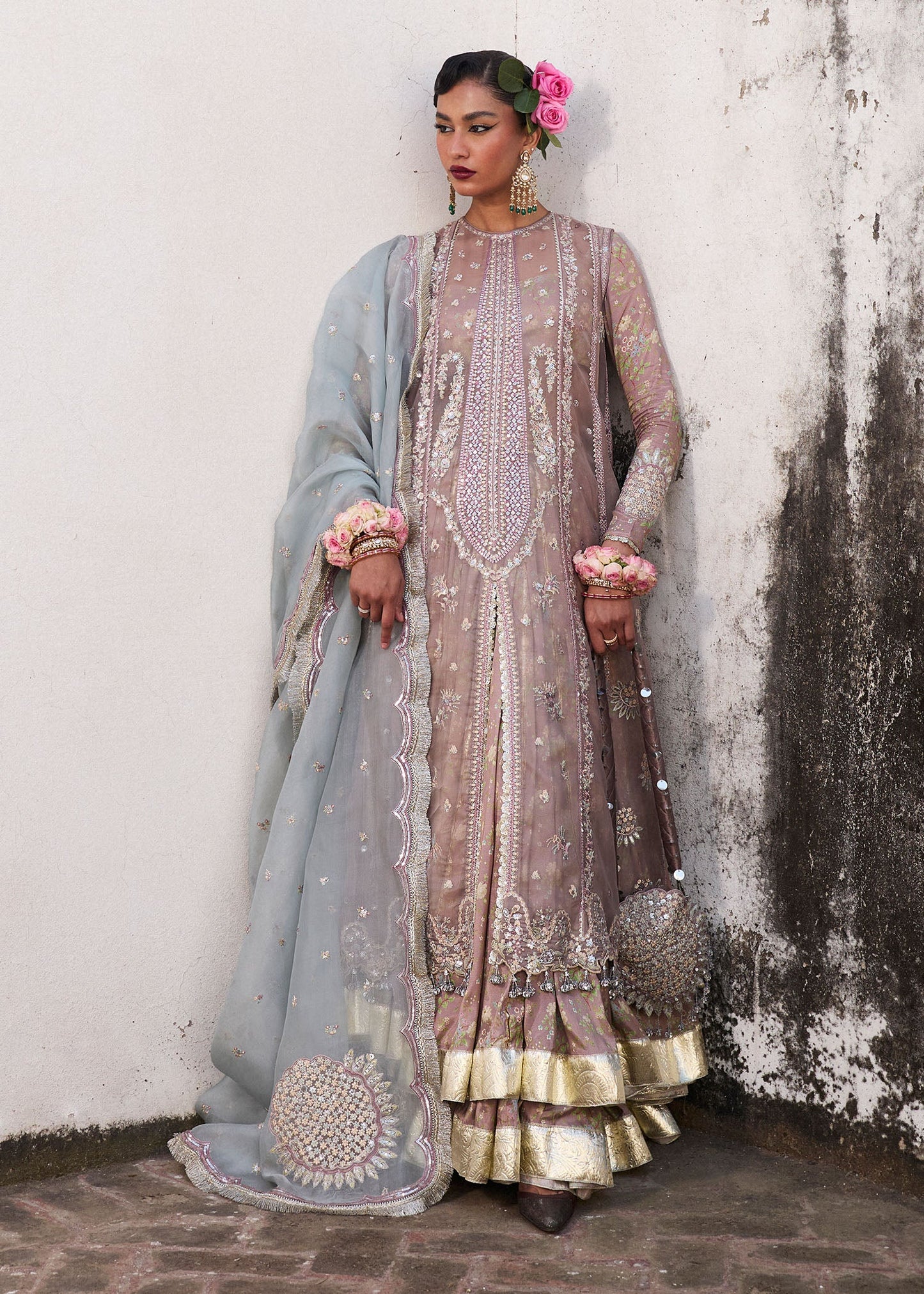 Model wearing Hussain Rehar Ziniya grey embroidered festive dress with intricate embellishments. Shop Pakistani clothes online in the UK now.
