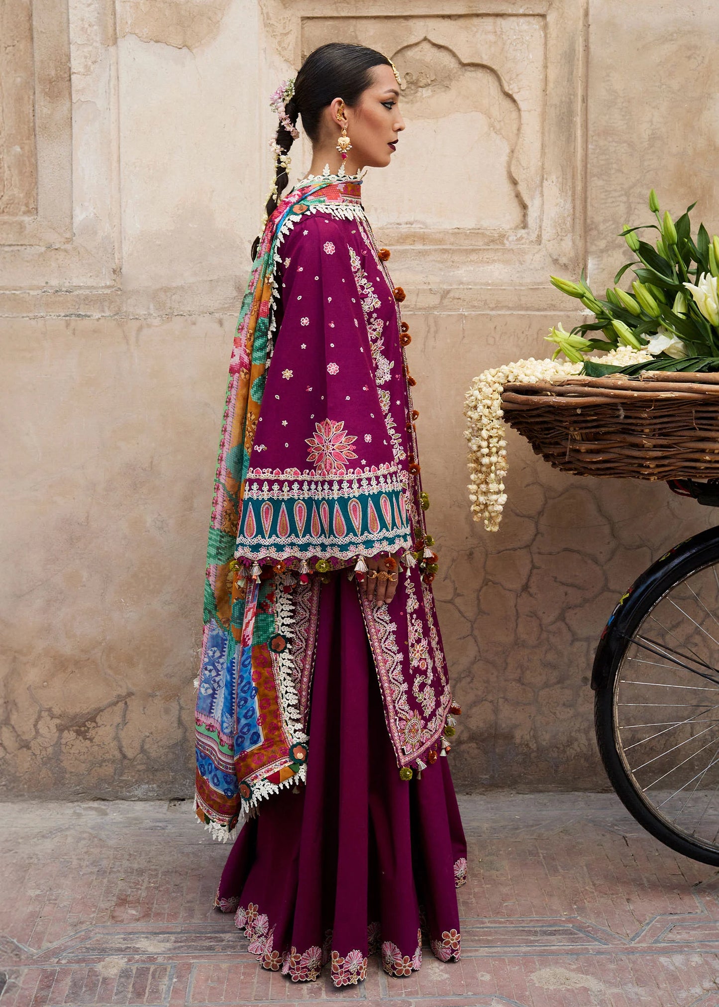 Model wearing deep magenta Kahei from Hussain Rehar Nirmal SS '25, Pakistani luxury pret and Pakistani clothes online in UK.