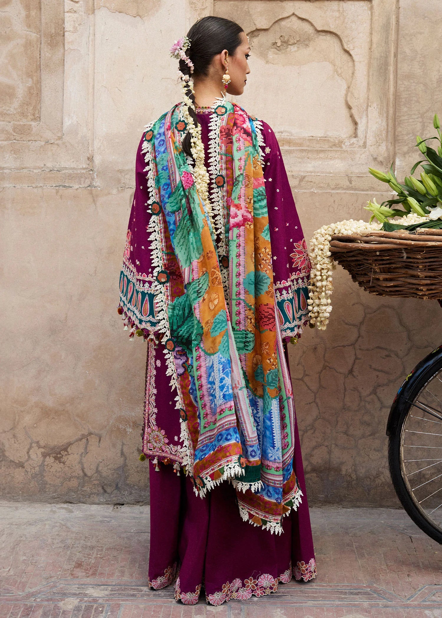 Model wearing deep magenta Kahei from Hussain Rehar Nirmal SS '25, Pakistani luxury pret and Pakistani clothes online in UK.