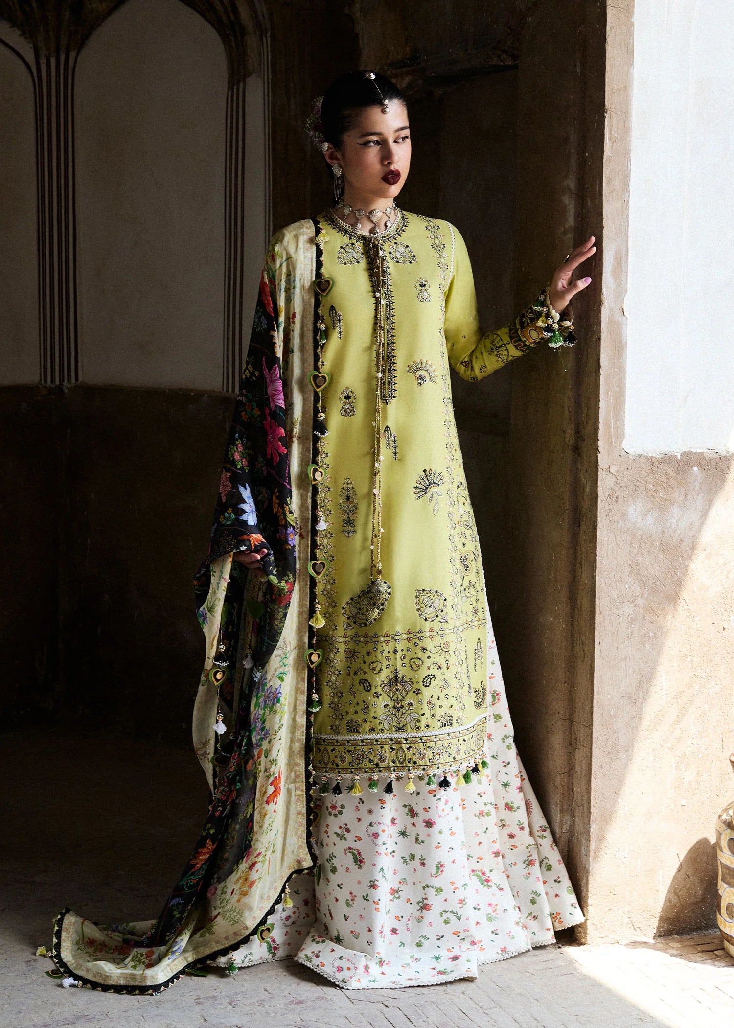 Model wearing lime green and multicolor Suk from Hussain Rehar Nirmal SS '25, Pakistani luxury pret and Pakistani clothes online in UK.
