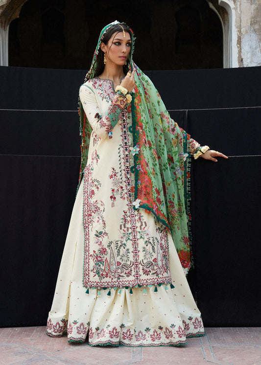 Model wearing cream and green Sahil from Hussain Rehar Nirmal SS '25, Pakistani luxury pret and Pakistani clothes online in UK.