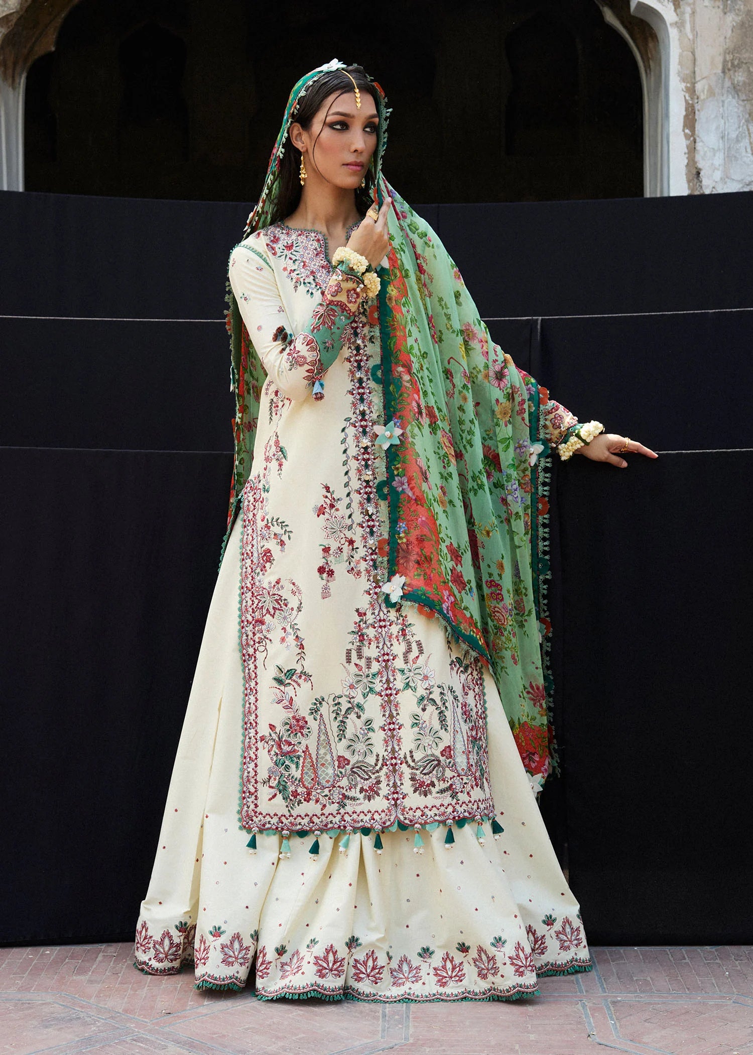 Model wearing cream and green Sahil from Hussain Rehar Nirmal SS '25, Pakistani luxury pret and Pakistani clothes online in UK.