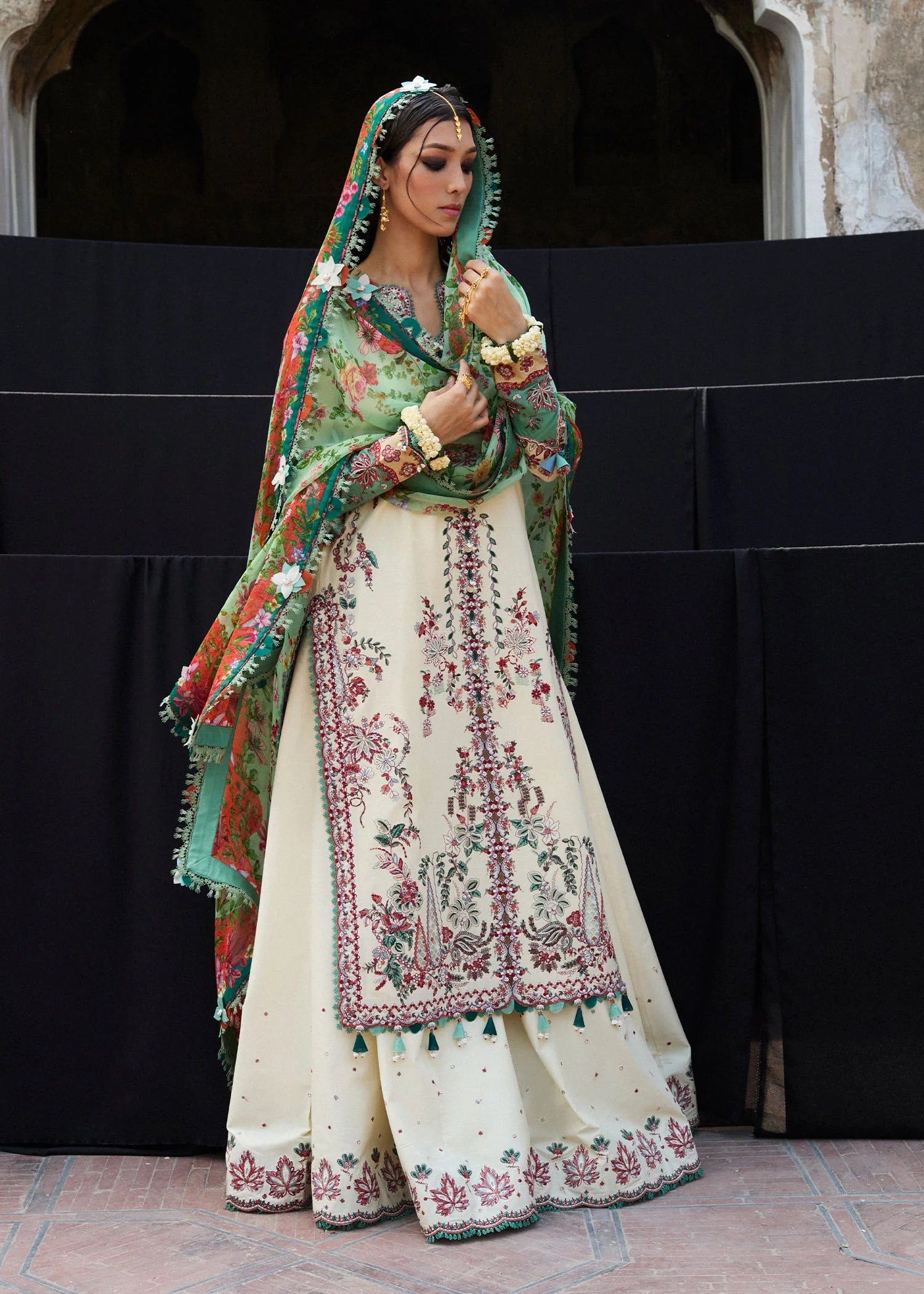 Model wearing cream and green Sahil from Hussain Rehar Nirmal SS '25, Pakistani luxury pret and Pakistani clothes online in UK.