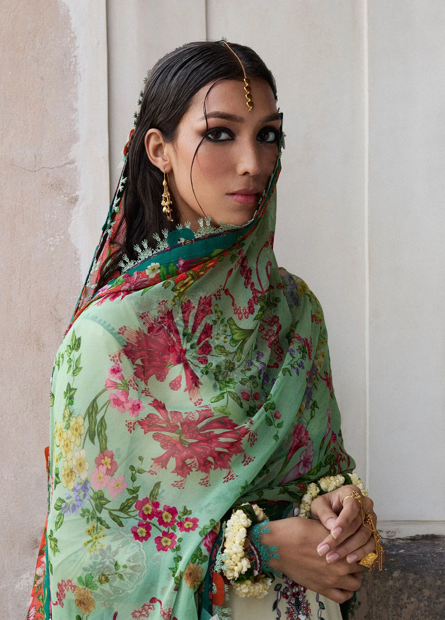 Model wearing cream and green Sahil from Hussain Rehar Nirmal SS '25, Pakistani luxury pret and Pakistani clothes online in UK.
