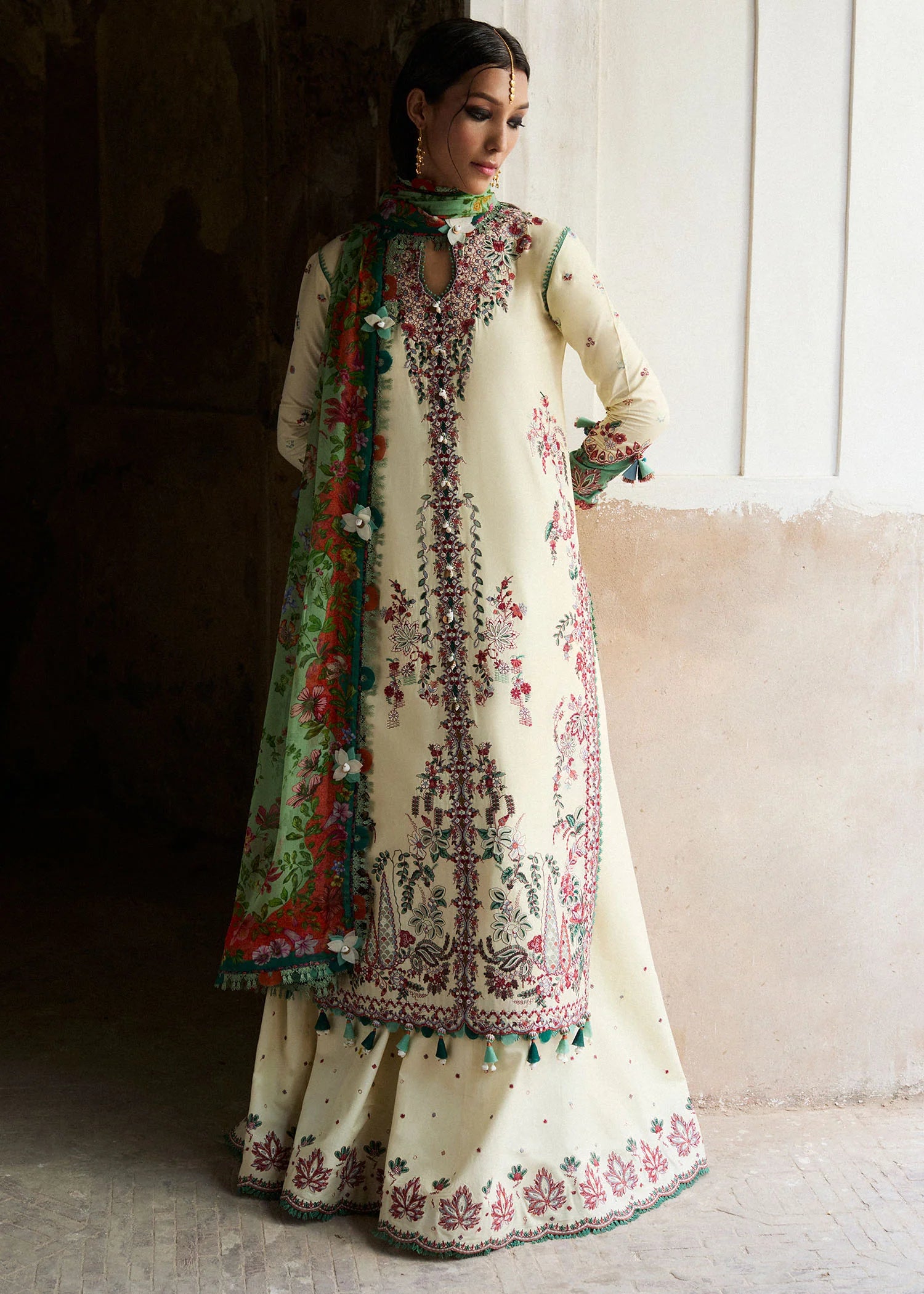 Model wearing cream and green Sahil from Hussain Rehar Nirmal SS '25, Pakistani luxury pret and Pakistani clothes online in UK.