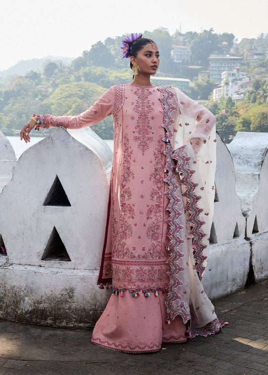 Model wearing Hussain Rehar Luxury Lawn '25 Peaar in blush pink with intricate embroidery. Shop Pakistani luxury pret online in the UK.