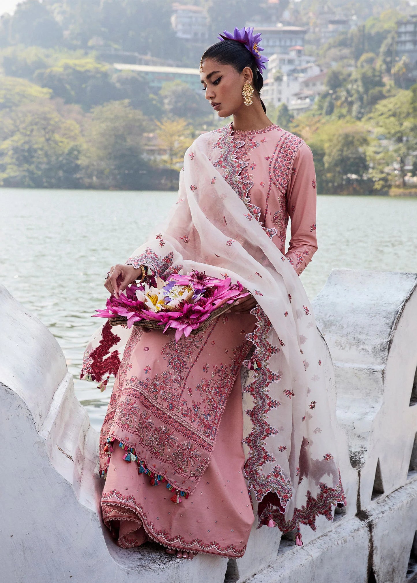 Model wearing Hussain Rehar Luxury Lawn '25 Peaar in blush pink with intricate embroidery. Shop Pakistani luxury pret online in the UK.