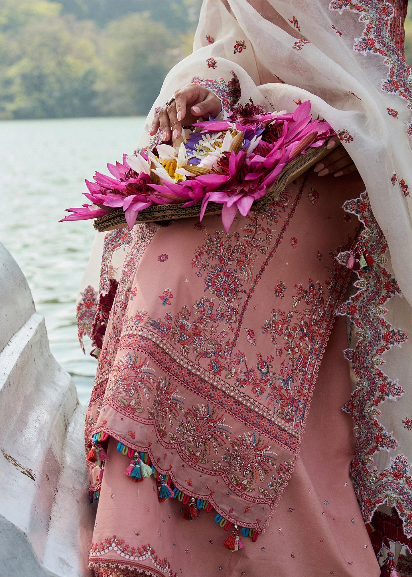 Model wearing Hussain Rehar Luxury Lawn '25 Peaar in blush pink with intricate embroidery. Shop Pakistani luxury pret online in the UK.