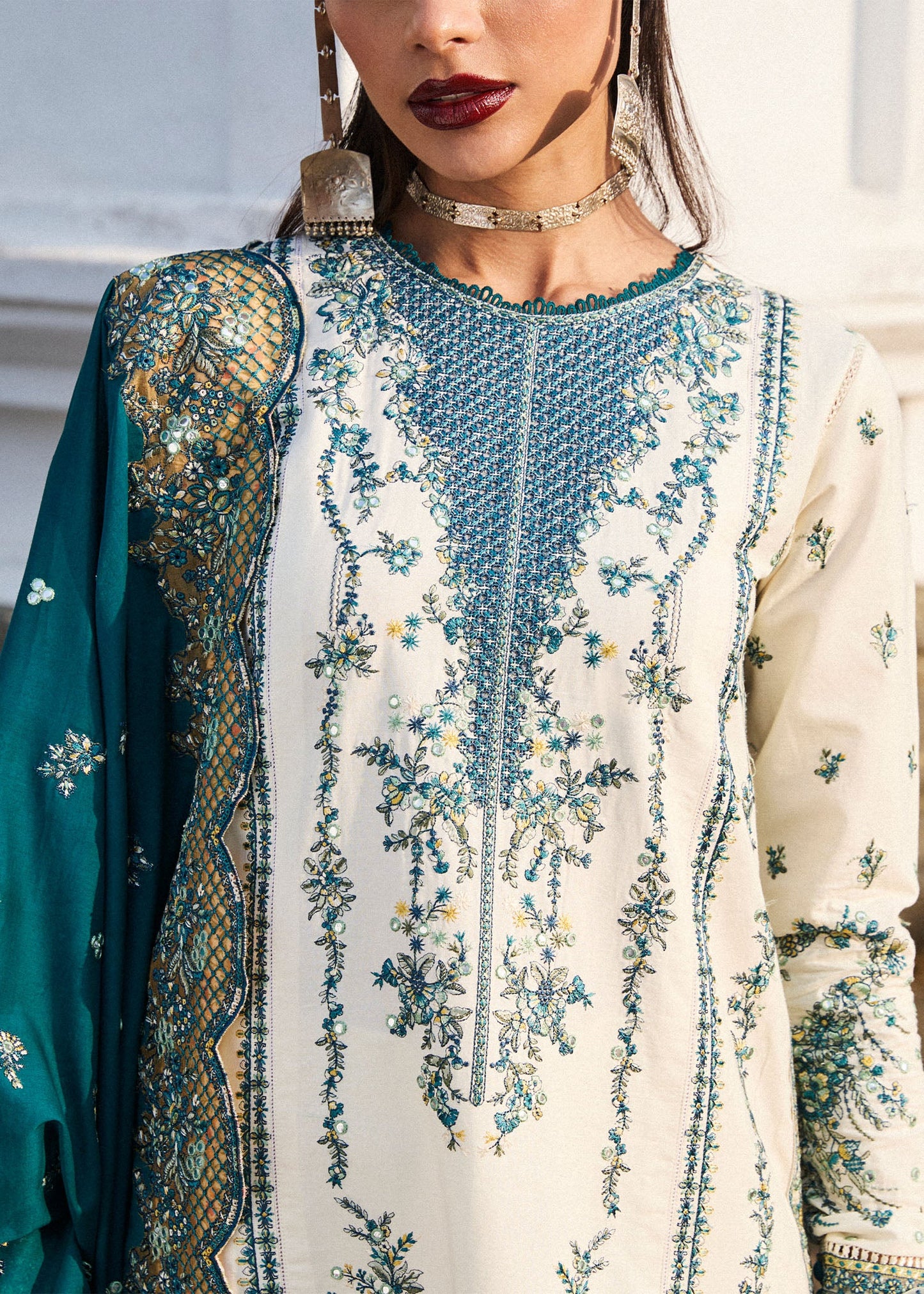 Model wearing Hussain Rehar Luxury Lawn '25 Veil in ivory with teal embroidery. Shop Pakistani luxury pret online in the UK.