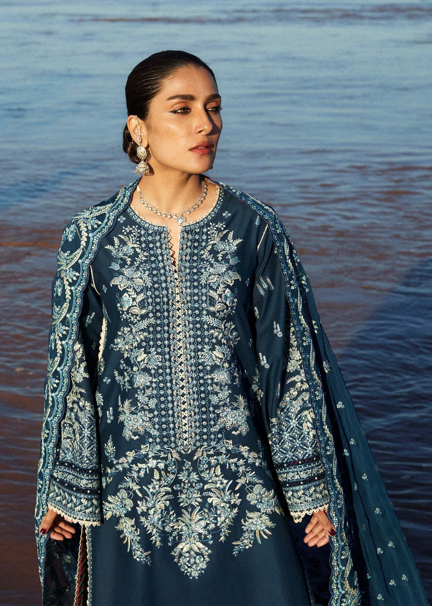 Model wearing navy blue dress Meherbano by Hussain Rehar, Pakistani luxury pret online in UK.