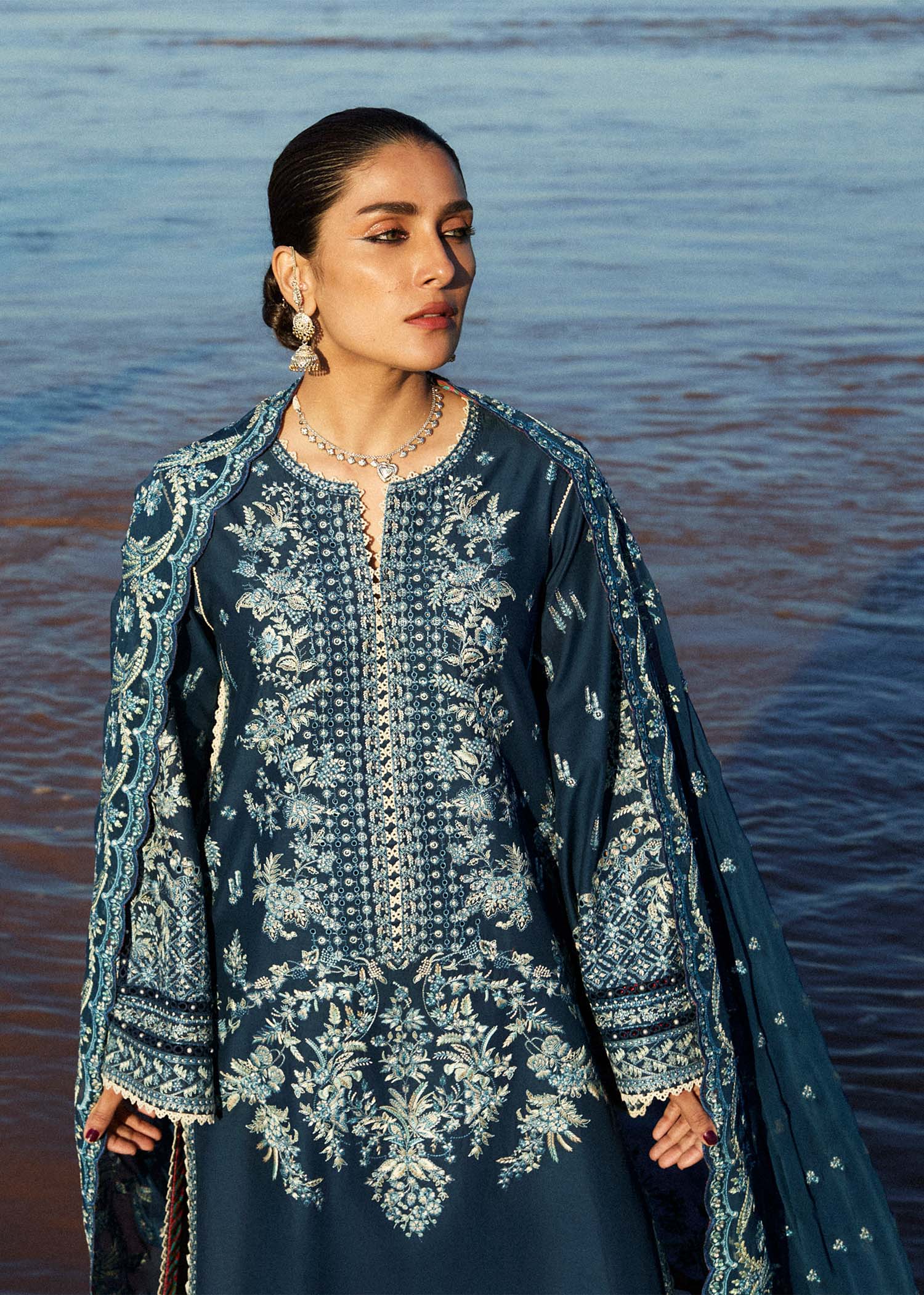 Model wearing navy blue dress Meherbano by Hussain Rehar, Pakistani luxury pret online in UK.