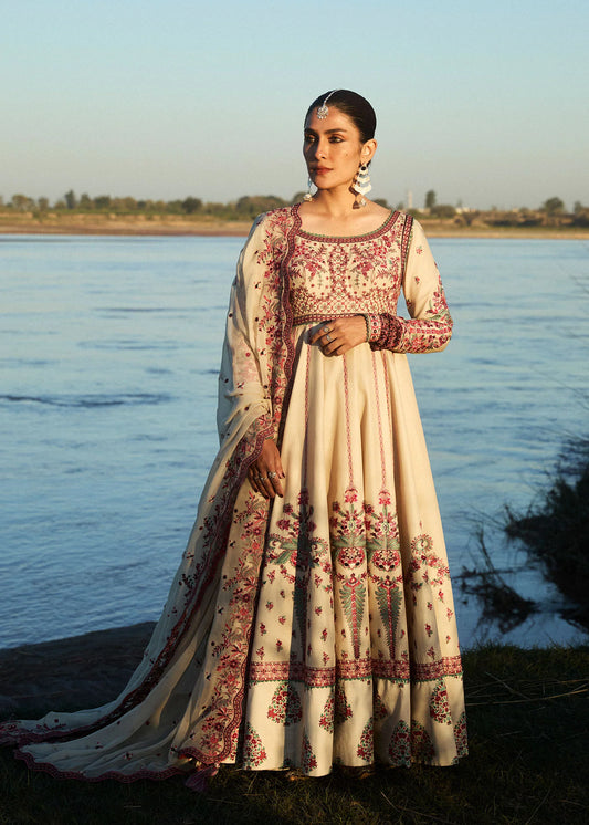 Model wearing ivory and maroon Naqsh dress from Hussain Rehar, featuring Pakistani luxury pret and Pakistani clothes online in UK.