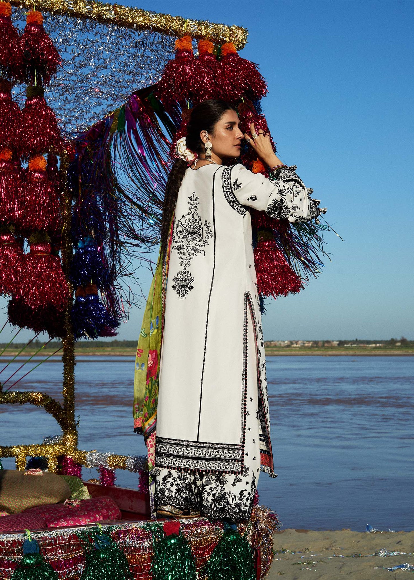 Model wearing cream and black dress Suroor by Hussain Rehar, Pakistani luxury pret online in UK.