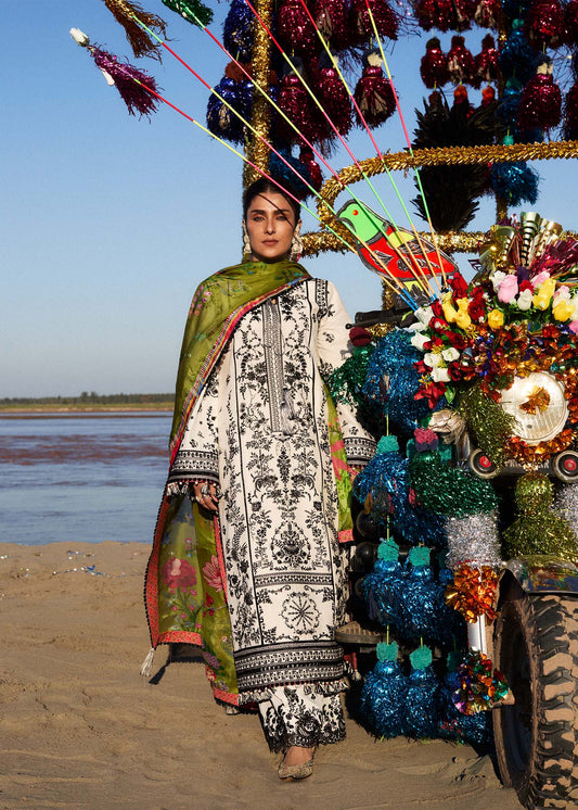 Model wearing cream and black dress Suroor by Hussain Rehar, Pakistani luxury pret online in UK.