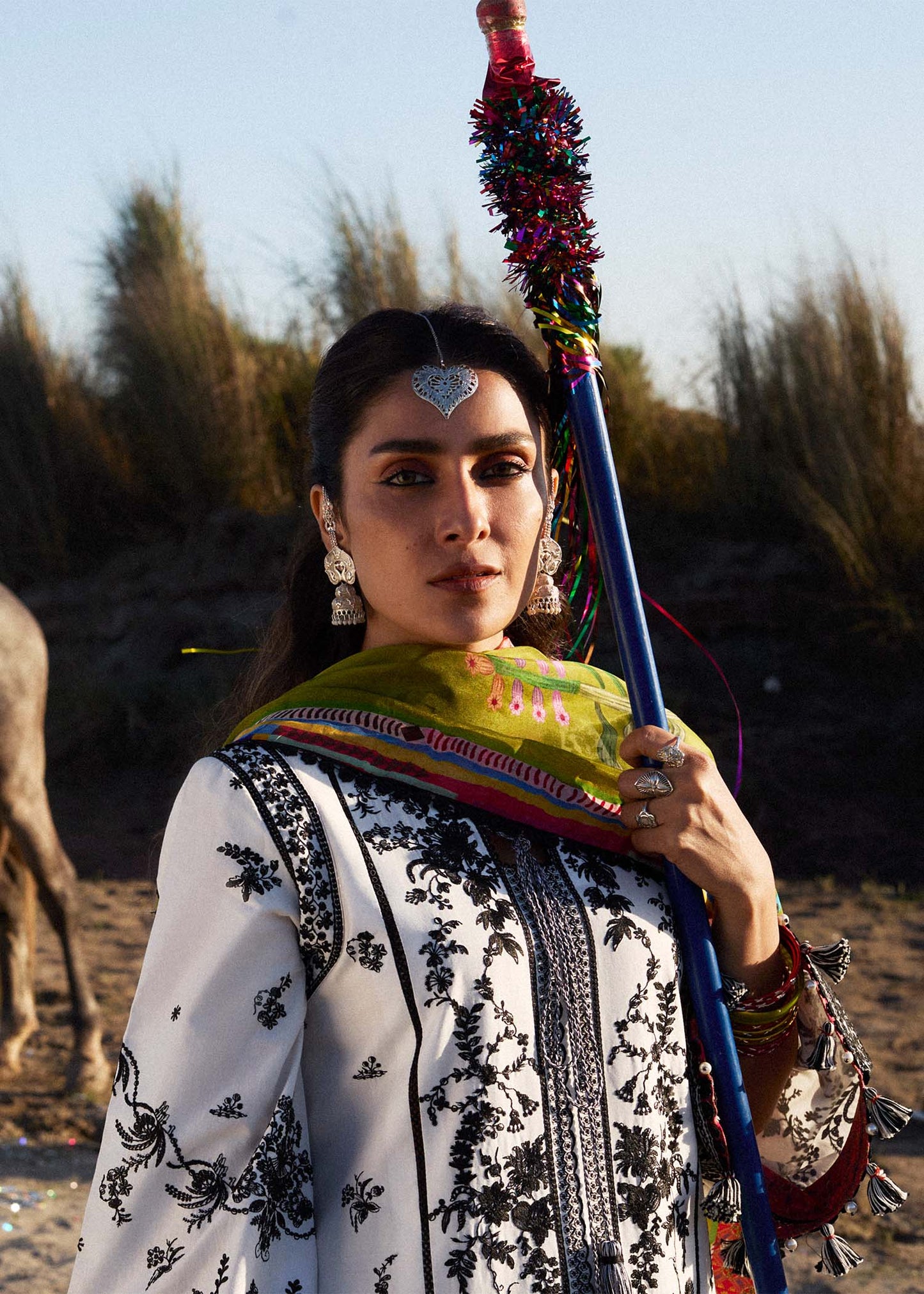 Model wearing cream and black dress Suroor by Hussain Rehar, Pakistani luxury pret online in UK.