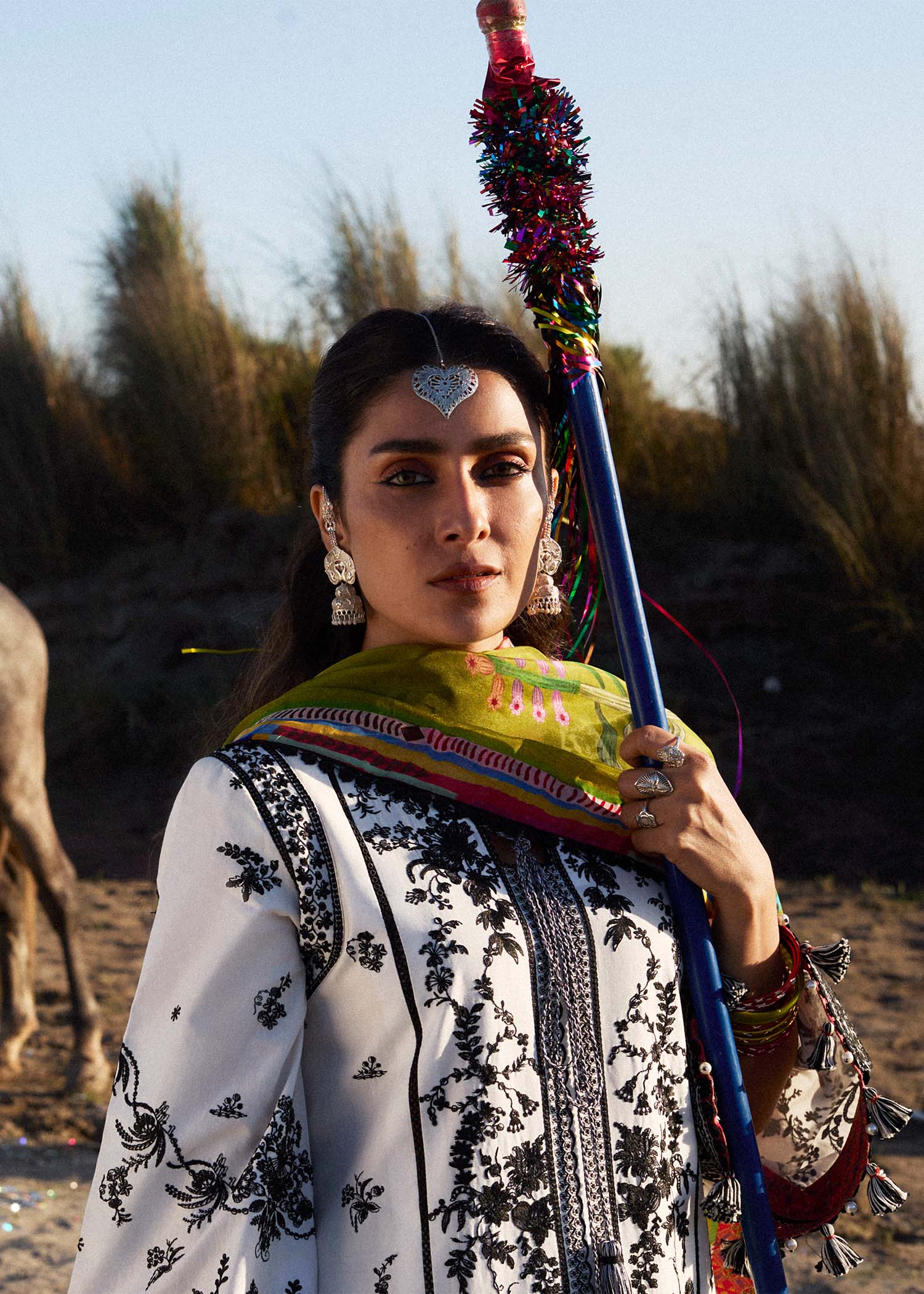 Model wearing cream and black dress Suroor by Hussain Rehar, Pakistani luxury pret online in UK.