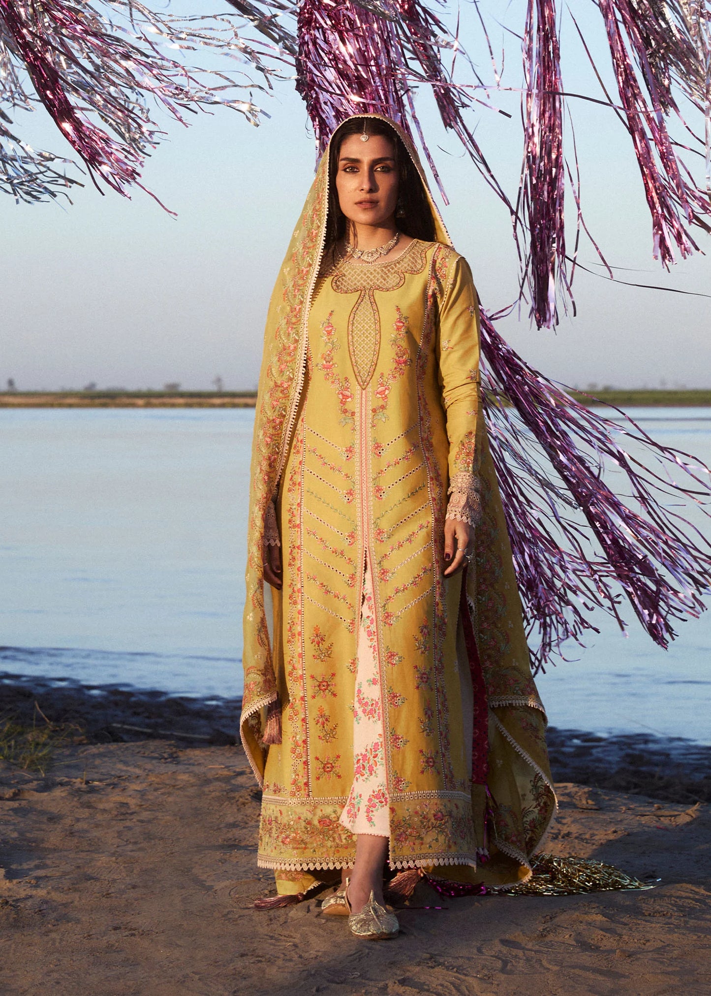Model wearing mustard and ivory Soana dress from Hussain Rehar, showcasing Pakistani luxury pret and Pakistani clothes online in UK.