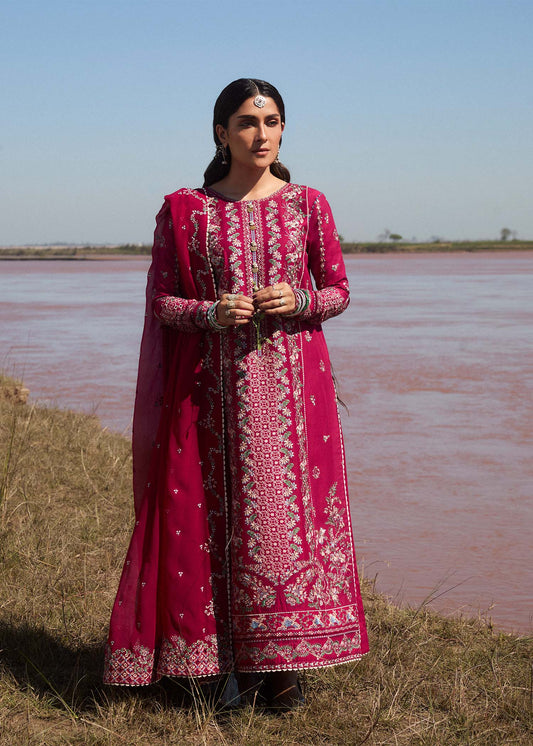 Model wearing deep pink embroidered dress Mehrunisa by Hussain Rehar, Pakistani luxury pret online in UK.