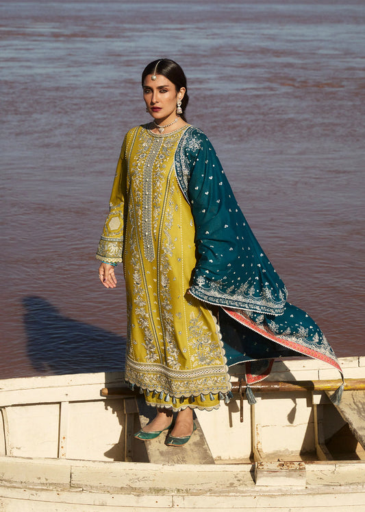 Model wearing mustard embroidered dress Shamyaana by Hussain Rehar, Pakistani luxury pret online in UK.