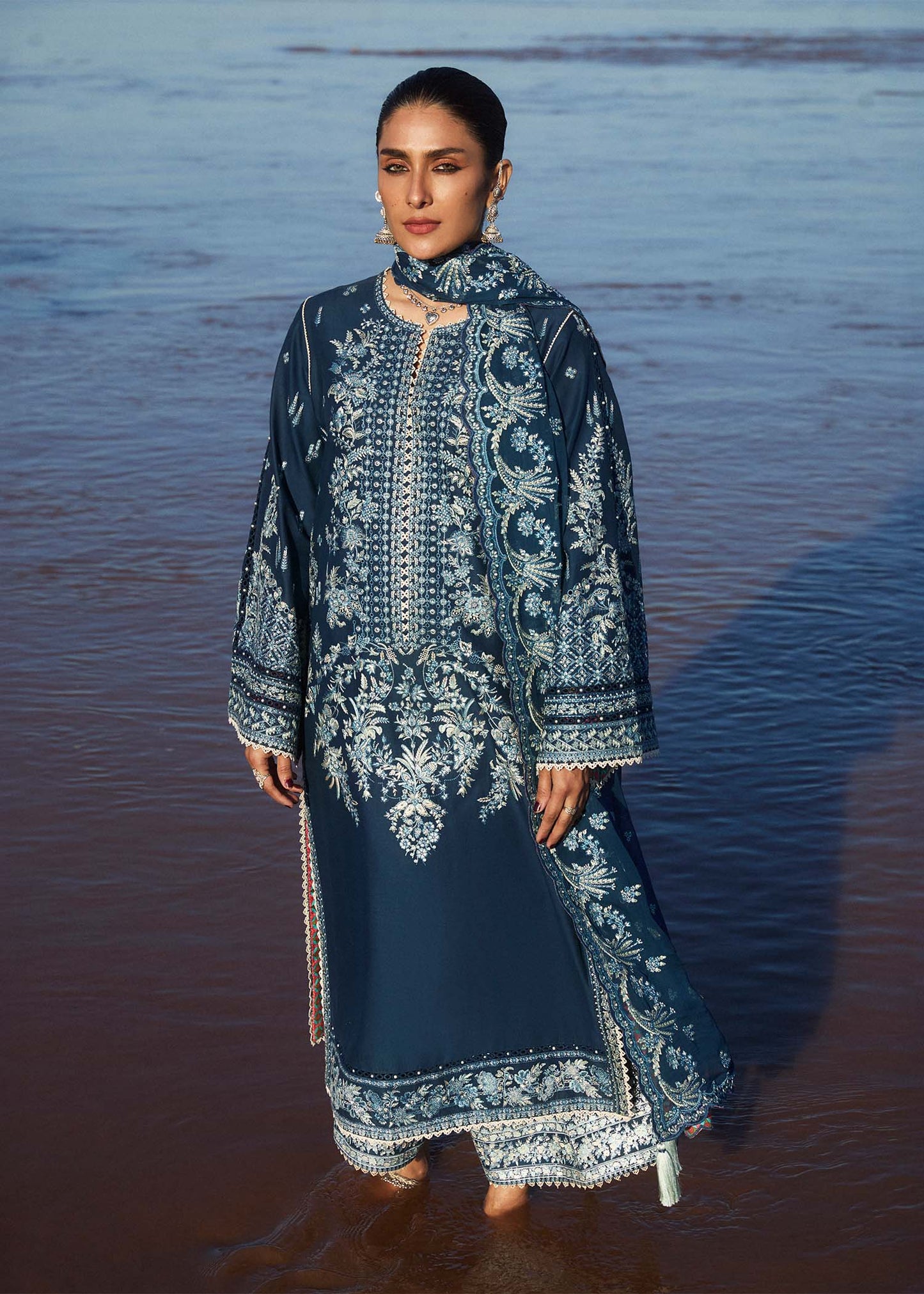 Model wearing navy blue dress Meherbano by Hussain Rehar, Pakistani luxury pret online in UK.