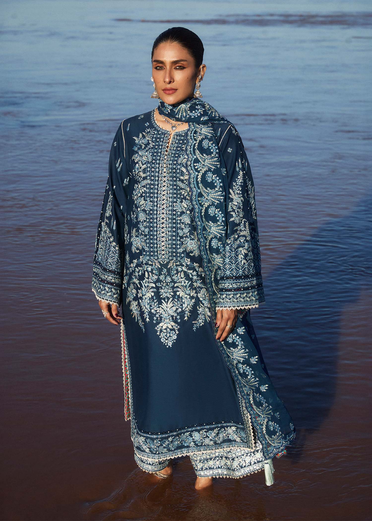 Model wearing navy blue dress Meherbano by Hussain Rehar, Pakistani luxury pret online in UK.