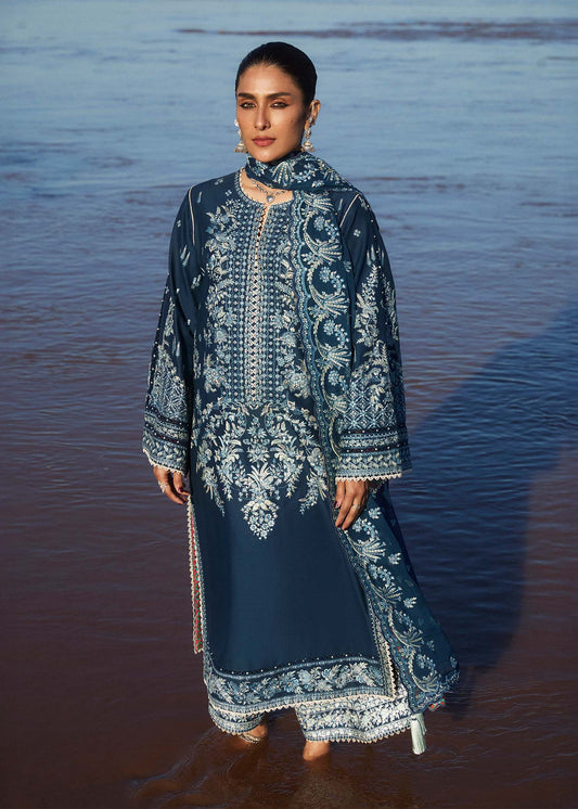Model wearing navy blue dress Meherbano by Hussain Rehar, Pakistani luxury pret online in UK.