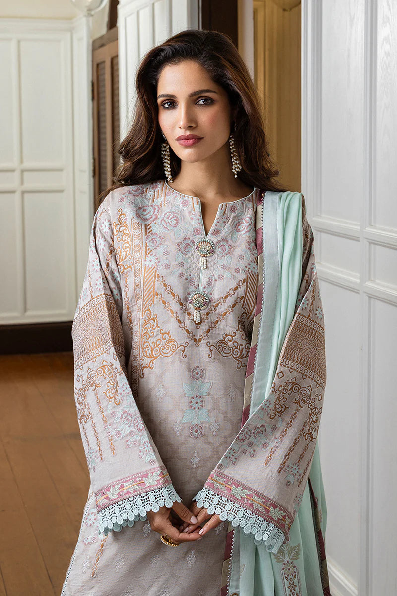 Model wearing soft pastel pink and mint Arsinoe dress from Mushq Seraph Jacquard Lawn '25, Pakistani Luxury pret, Pakistani clothes online in UK.