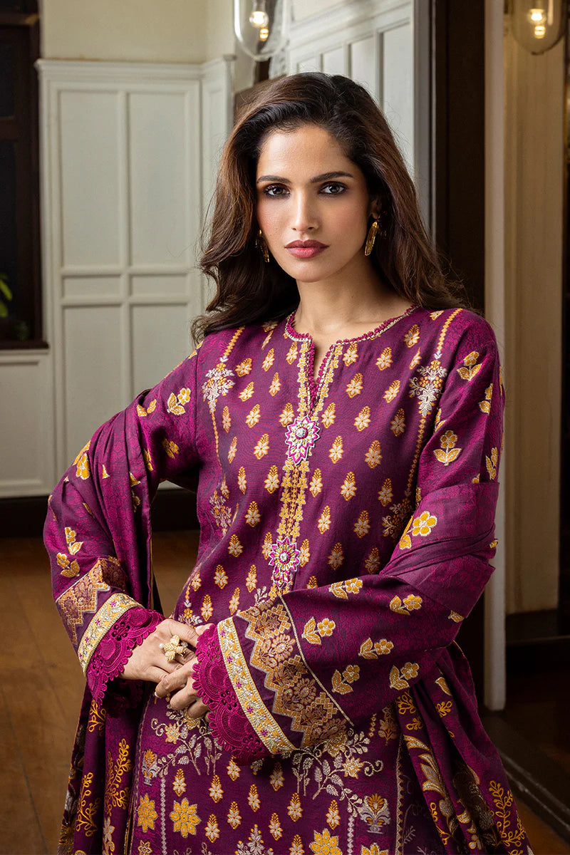 Model wearing purple and gold Eleanor dress from Mushq Seraph Jacquard Lawn '25, Pakistani Luxury pret, Pakistani clothes online in UK.