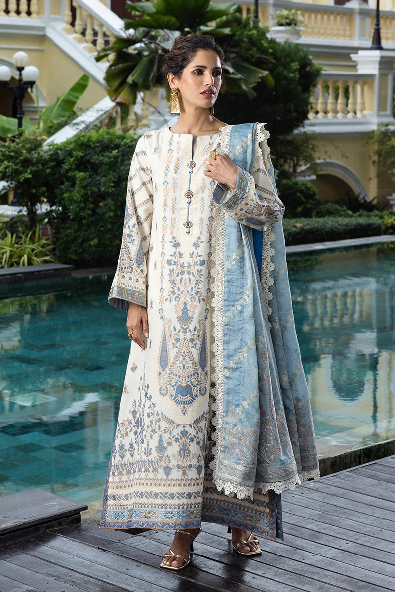 Model wearing ivory and powder blue Calafia dress from Mushq Seraph Jacquard Lawn '25, Pakistani Luxury pret, Pakistani clothes online in UK.