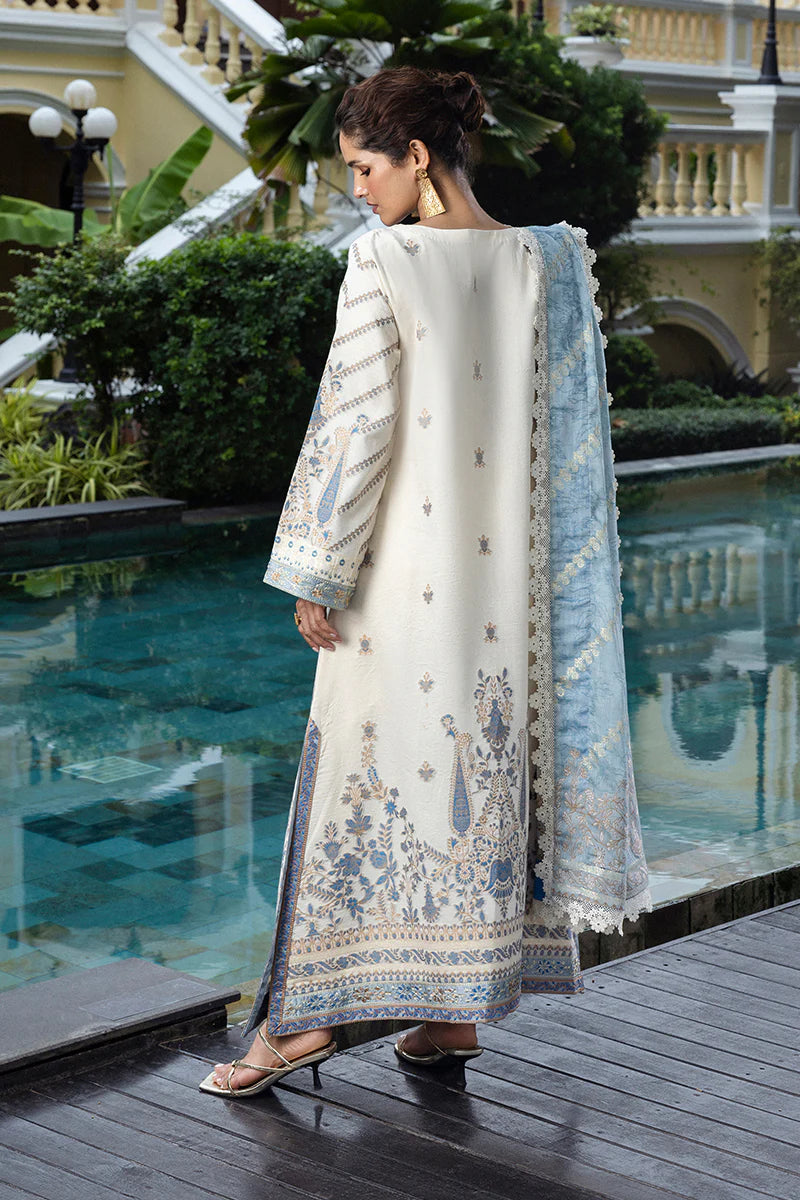 Model wearing ivory and powder blue Calafia dress from Mushq Seraph Jacquard Lawn '25, Pakistani Luxury pret, Pakistani clothes online in UK.