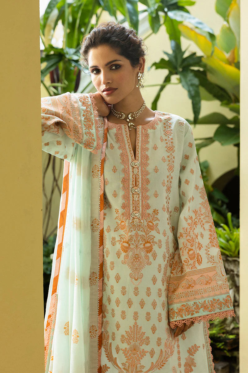 Model wearing mint and peach Amalthea dress from Mushq Seraph Jacquard Lawn '25, Pakistani Luxury pret, Pakistani clothes online in UK.