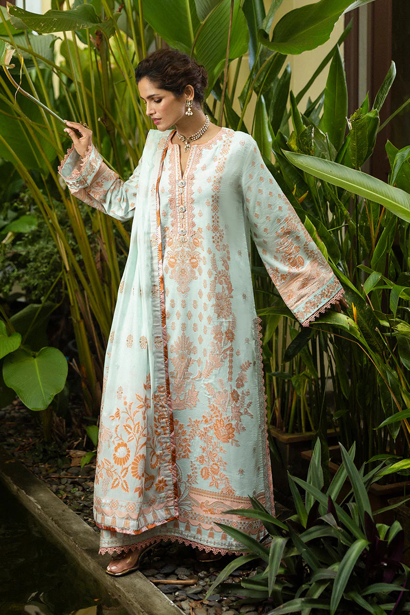 Model wearing mint and peach Amalthea dress from Mushq Seraph Jacquard Lawn '25, Pakistani Luxury pret, Pakistani clothes online in UK.