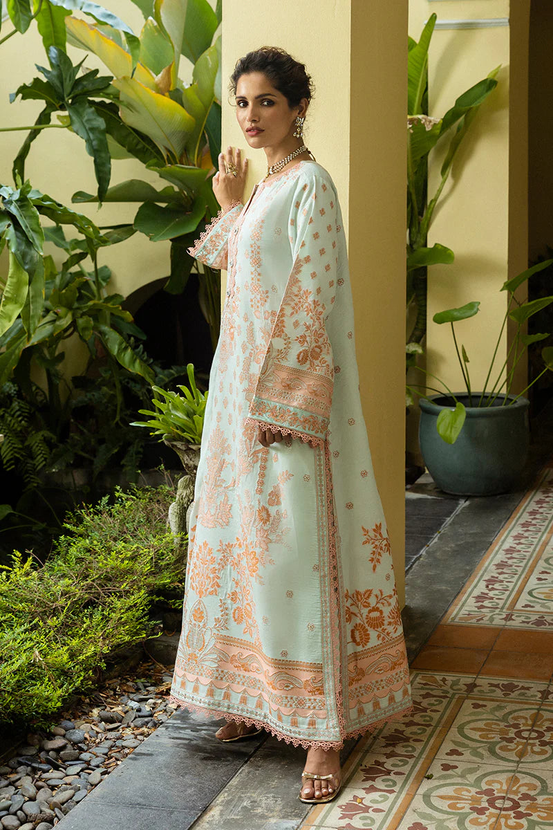 Model wearing mint and peach Amalthea dress from Mushq Seraph Jacquard Lawn '25, Pakistani Luxury pret, Pakistani clothes online in UK.