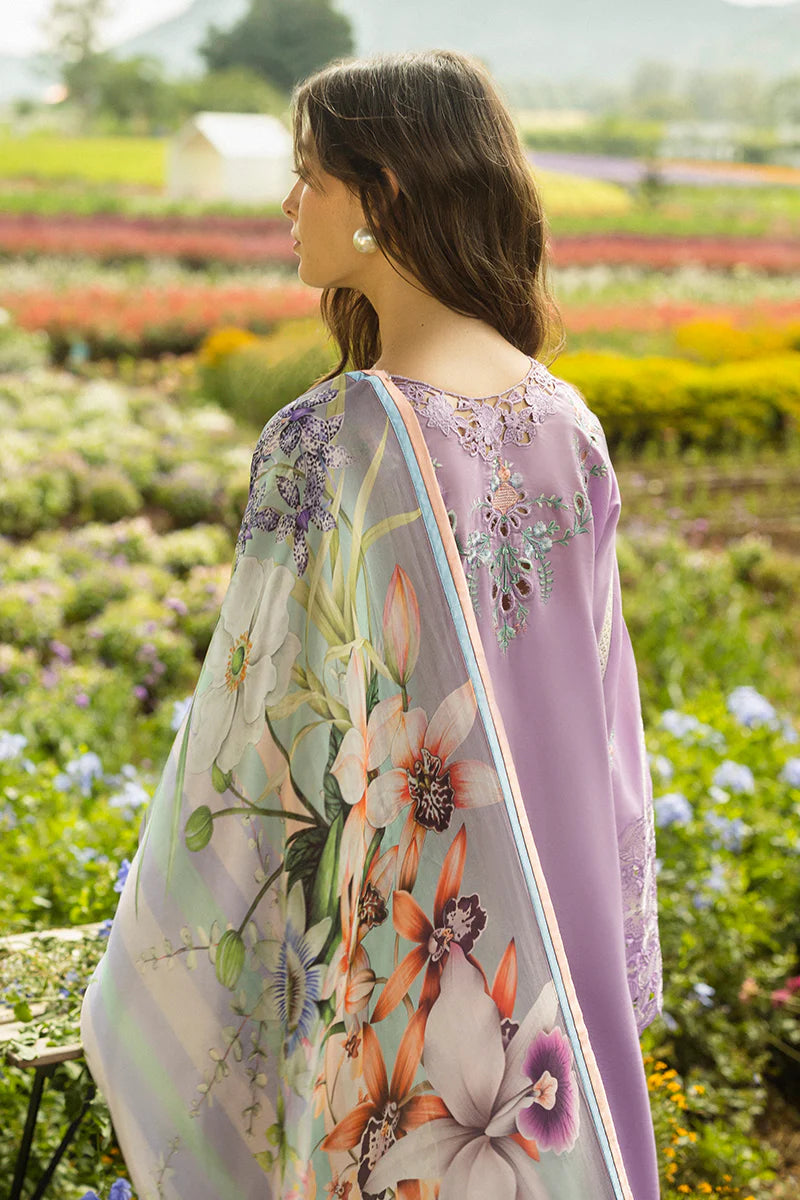 Model wearing lavender Pixies Blossom dress from Mushq Secret Garden Spring/Summer '25, Pakistani Luxury pret, Pakistani clothes online in UK.