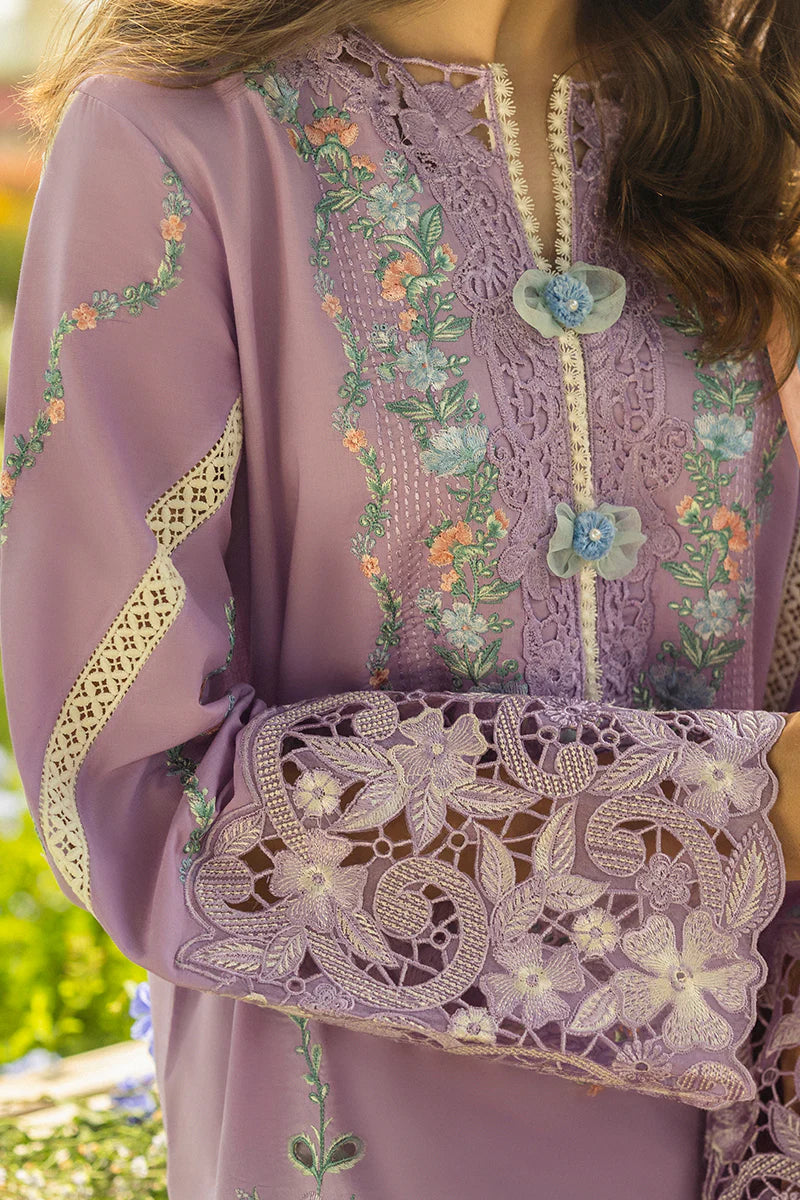 Model wearing lavender Pixies Blossom dress from Mushq Secret Garden Spring/Summer '25, Pakistani Luxury pret, Pakistani clothes online in UK.