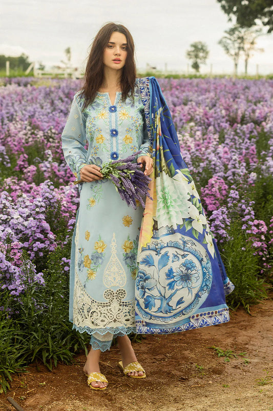 Model wearing pastel blue Hidden Oasis dress from Mushq Secret Garden Spring/Summer '25, Pakistani Luxury pret, Pakistani clothes online in UK.