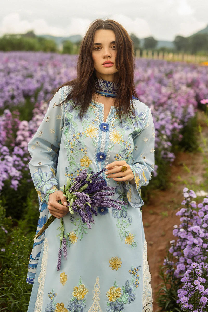 Model wearing pastel blue Hidden Oasis dress from Mushq Secret Garden Spring/Summer '25, Pakistani Luxury pret, Pakistani clothes online in UK.